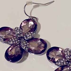 Earrings the stone: light purple/brown/gray color
